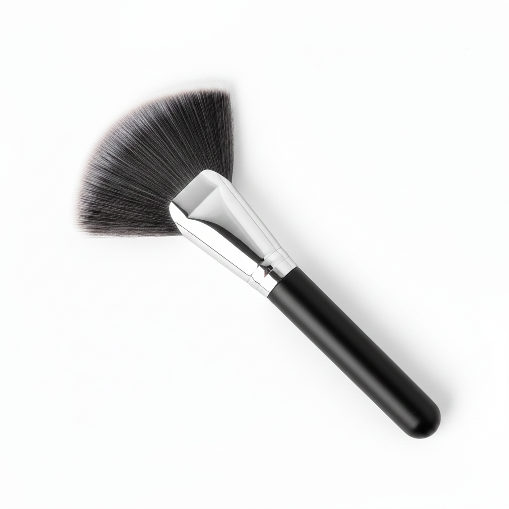 Fan blush brush with dark charcoal to grey ombre bristles and silver ferrule
