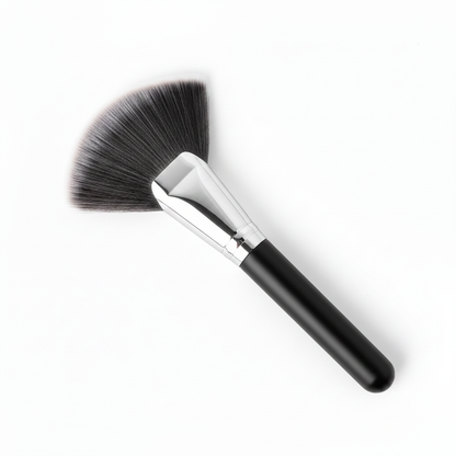 Fan blush brush with dark charcoal to grey ombre bristles and silver ferrule