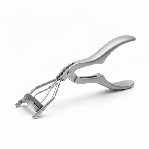 Matte silver grey ergonomic wide paddle-handle eyelash curler with triple spring wire clamp and grey silicone pad