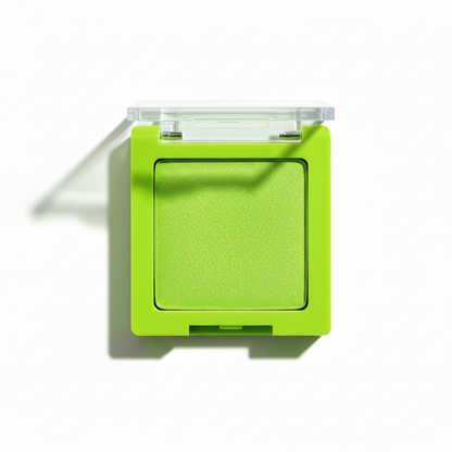 45-degree angle side view of neon lime green compact with clear flip lid open showing shimmer powder and hinge detail